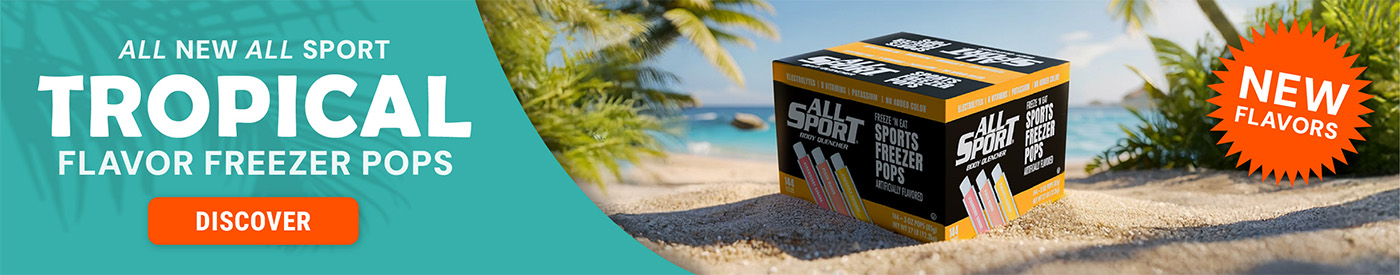 Box of All Sport Tropical Flavor Sports Freezer Pops displayed on a beach with palm trees in the background. Text reads “All New All Sport Tropical Flavor Freezer Pops” with a Shop Now button.